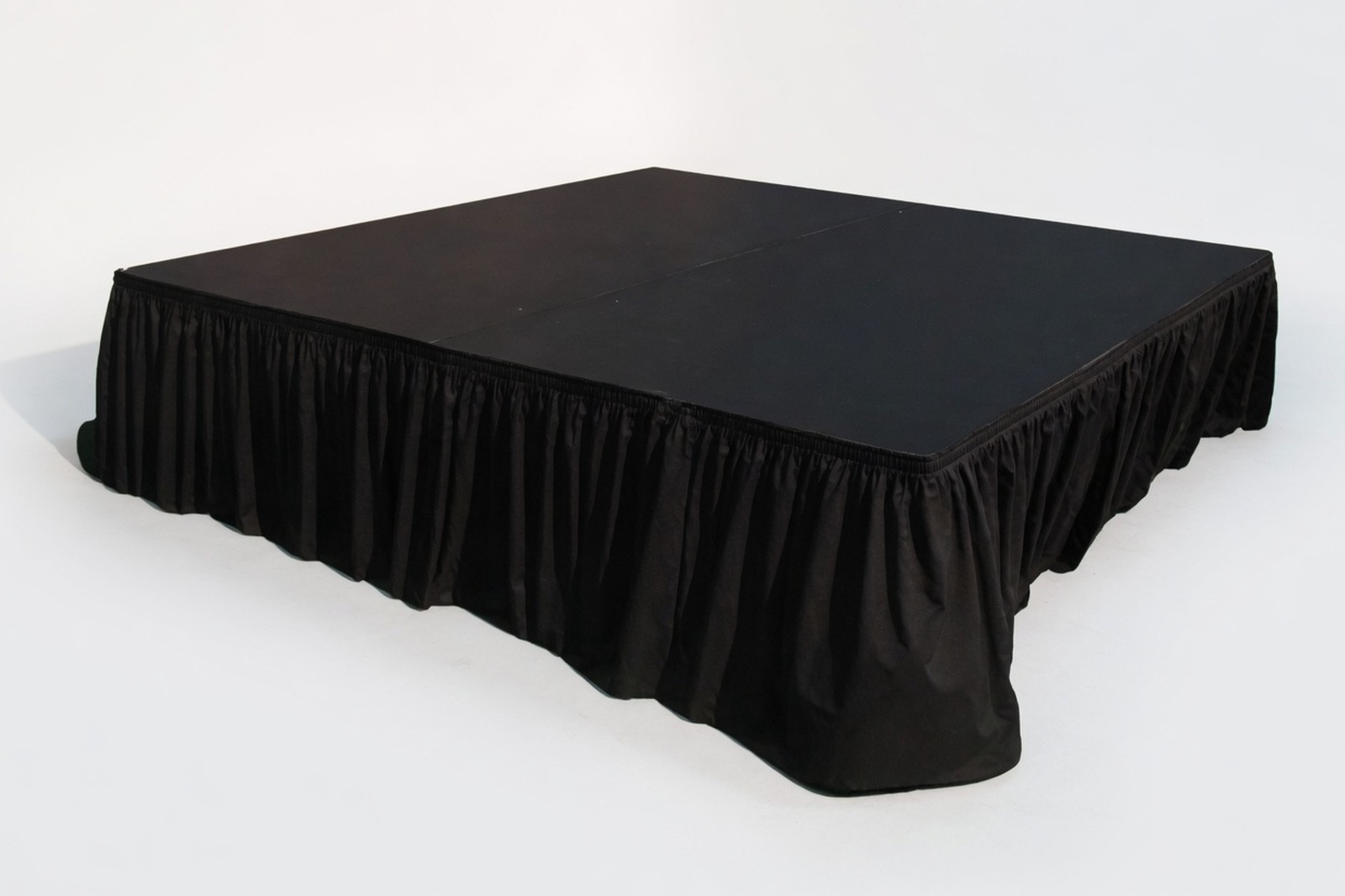 Event stage with black skirting